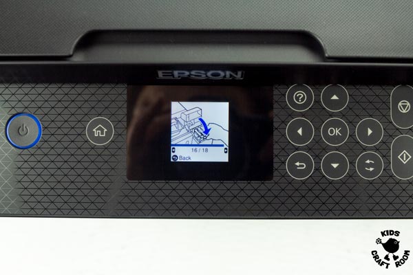 The front of a printer showing its digital display.