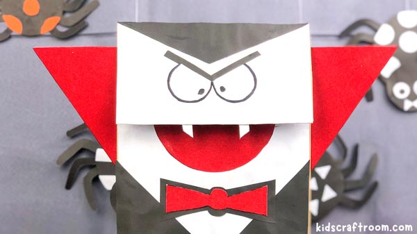 A close up of a Paper Bag Vampire Puppet.