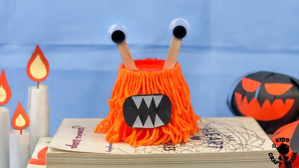 A close up of a kid made monster craft.
