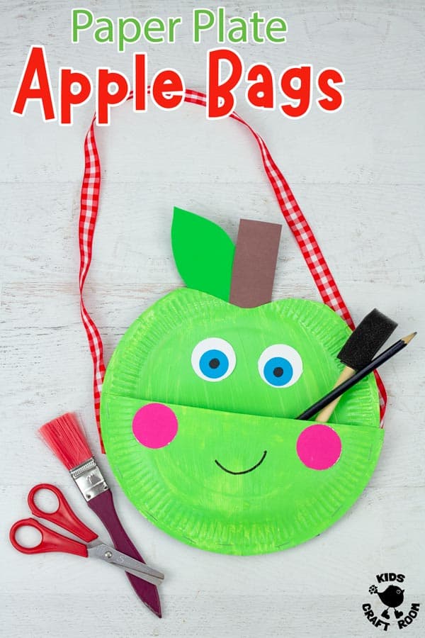A green Paper Plate Apple Bag Craft with a red gingham shoulder strap. It's holding a pencil and sponge brush.