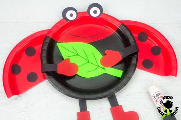 Paper Plate Ladybug Craft step 10.