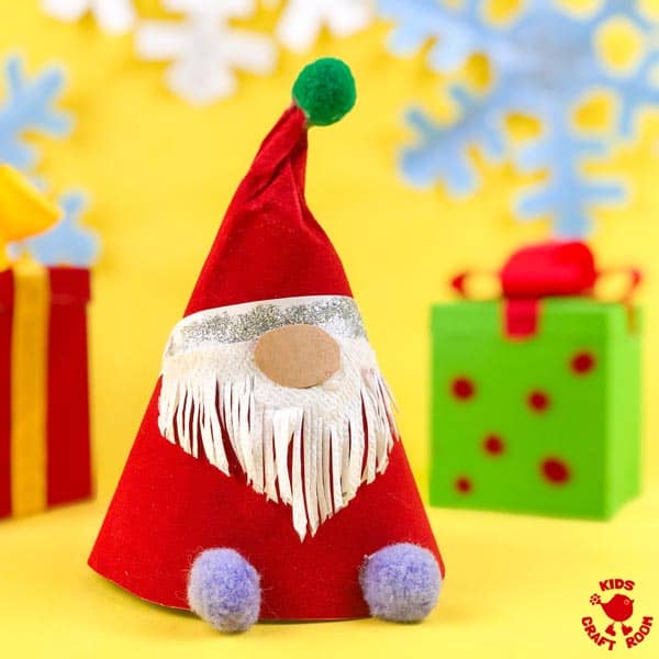Paper Plate Christmas Gnome Craft on yellow with snowflakes and gifts in the background.
