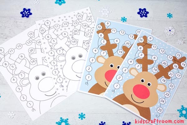 All four printable Christmas Lights Reindeer Advent Calendars fanned out on a tabletop.