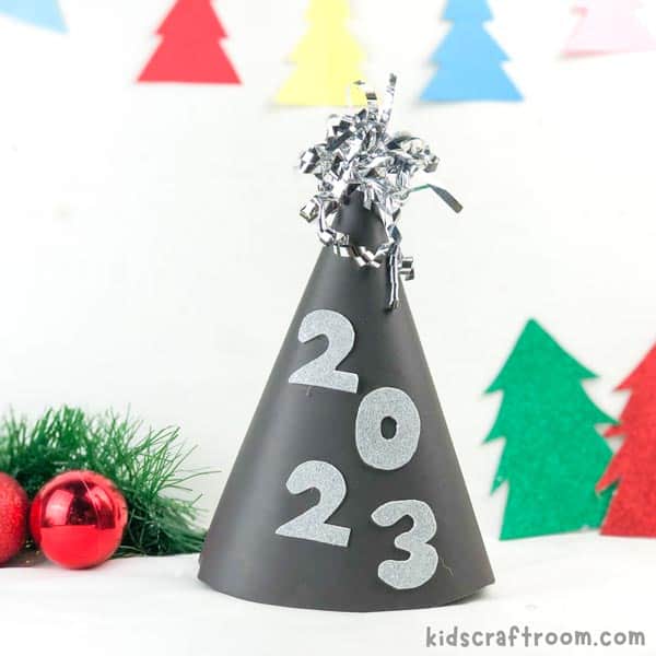 New Year's Eve Party Hat in black with silver glitter numbers 2023.