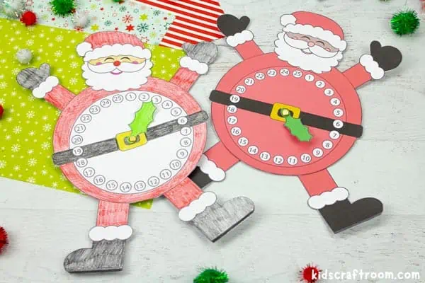 A close up of Santa Christmas Countdown Clocks, showing the holly leaf clock hand on Santa's tummy.