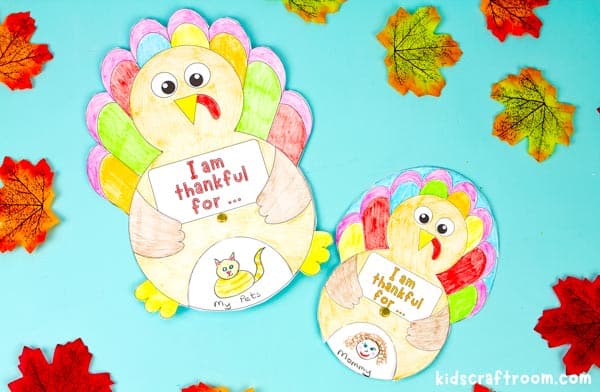 2 I am Thankful Turkey Spinners. The right shows a picture of pets and the left of mommy.