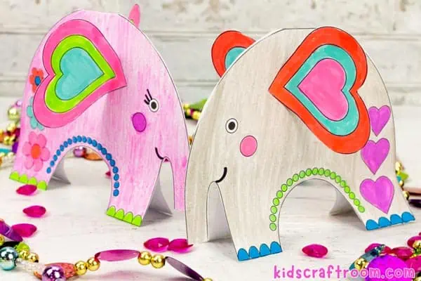 A pair of Valentine Elephant Crafts facing each other.