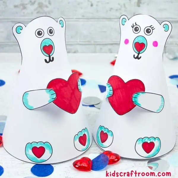 2 Valentine Polar Bears holding hearts and facing each other.