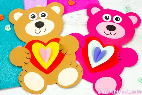 A brown and pink Bear Valentine Craft, side by side and slightly overlapping.