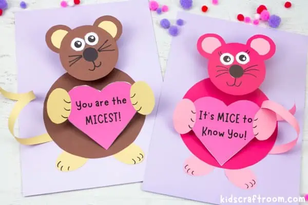 A brown and a pink Bobble Head Mouse Craft side by side. They are holding hearts with mouse puns written on them.