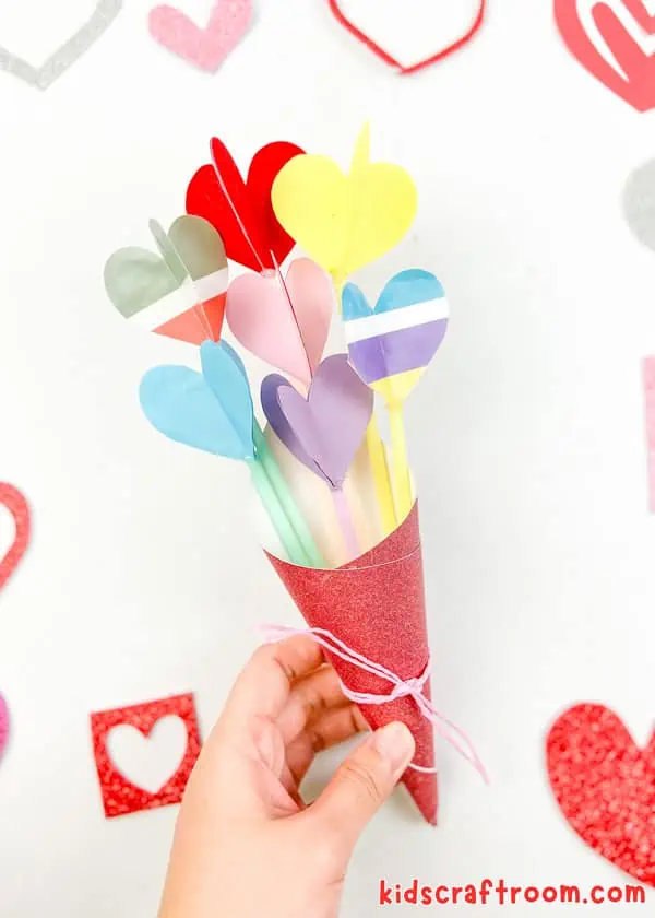 A Heart Bouquet Craft being held up by a hand.