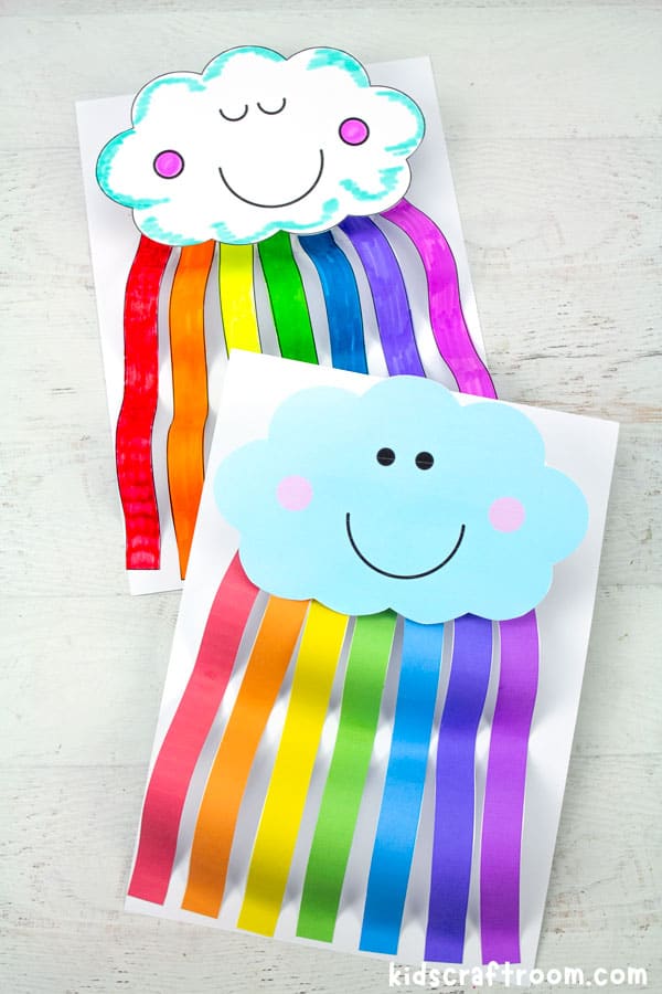 A Rainbow Cloud Craft that has been coloured in and another that is ready coloured.
