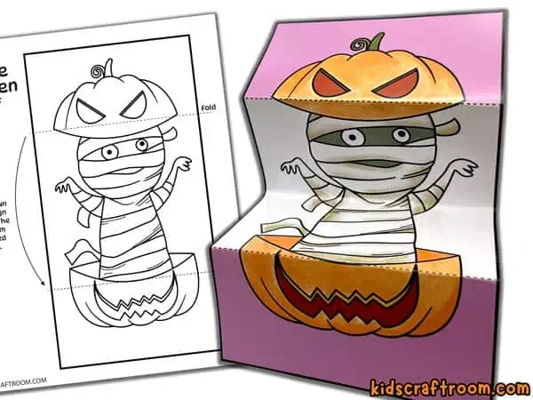 A hidden ghost Surprise Halloween Card shown before it's coloured in and after it's coloured in.