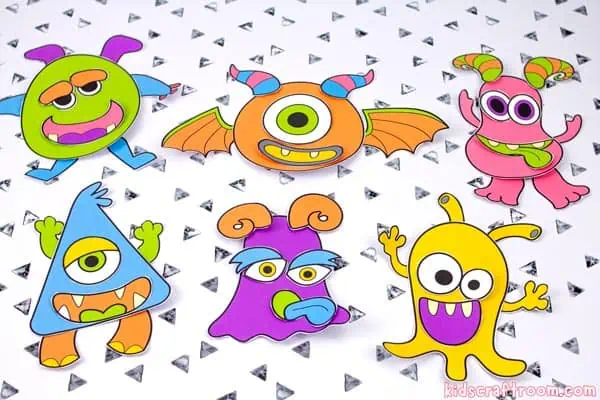 6 different build a monster crafts made from coloured paper body parts.