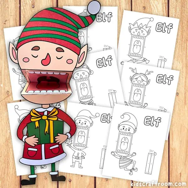 A close up of a singing elf paper puppet. It's holding a green gift box. Behind it are a selection of elf puppet templates in black and white.