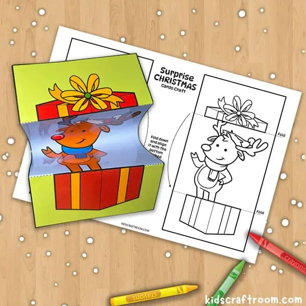 A surprise Christmas Card coloring sheet featuring a reindeer. Next to it is a colored card showing a gift box on the outside and a reindeer hiding inside. 