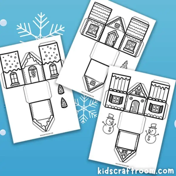 Three winter paper house templates spread out on a blue background. 