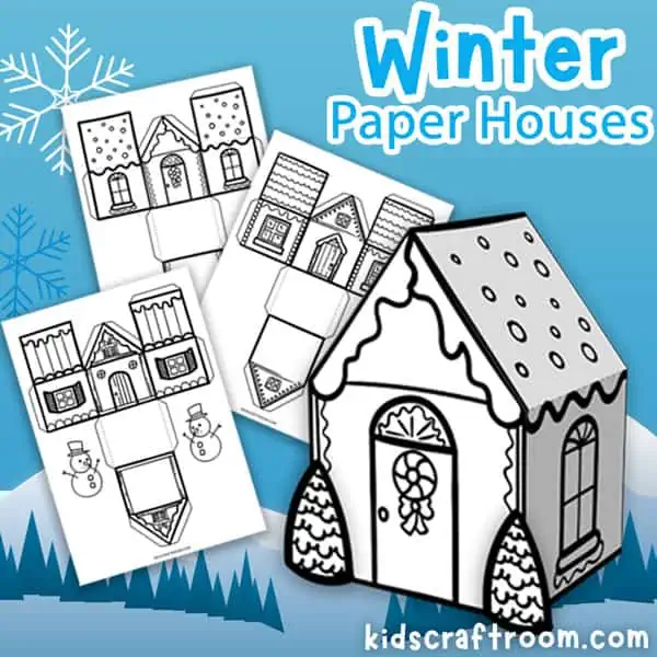 Three paper house templates on a blue background. In the foreground there is a built 3D winter paper house with a snowy roof and a wreath on the door.